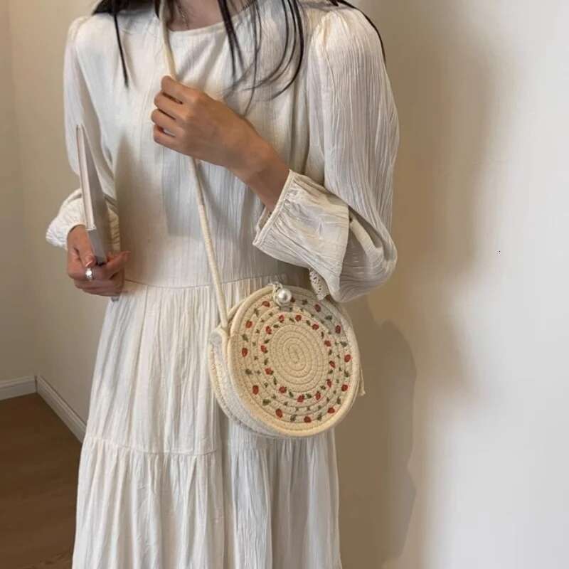 Popular Hand-Woven Women New Seaside Crossbody Retro Chic Beach Holiday Personality Straw Ins Small Round Bag
