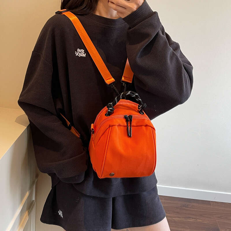 Lightweight Waterproof Simple Handbag 2025 New Women's Design Versatile Double Shoulder Shell Bag Mommy Backpack