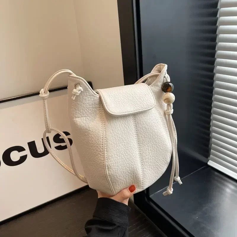 Leather womens bag first layer cowhide shell bag candy color mobile phone fashion all shoulder crossbody bag 250606