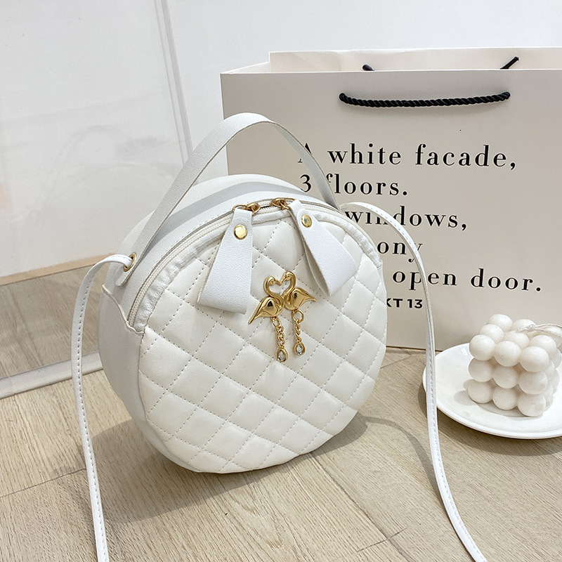 High quality brand high-quality new style free designer bag new small round handbag foreign trade wholesale quilted bag embroidered small bag new free