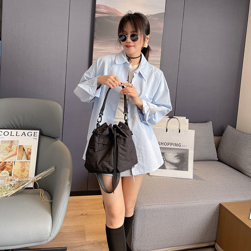 Free Shipping 2025 Summer New Casual Multifunctional Oxford Cloth Backpack Luxury Designer Bags Fashion Bucket Bag Handheld Shoulder Crossbody Bag