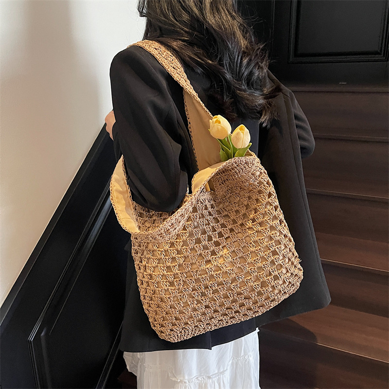 designer Casual Hollow Out Straw Woven Shoulder Bag New Summer Handheld Mesh Underarm Bag for Women Beach Vacation Beach Bag