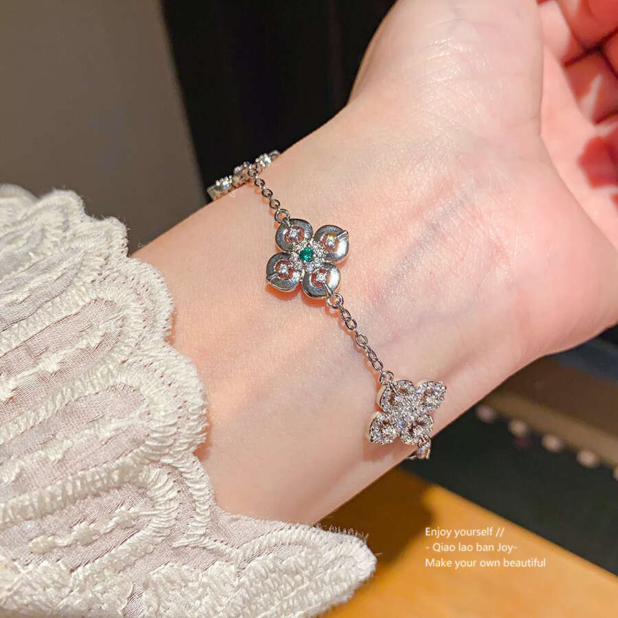 Luxury jewelry designer bracelet clover chain Zircon Four-Petal Flower Pull-Open 2025 New Super Shiny Exquisite Bracelet Niche High-End Design Jewelry