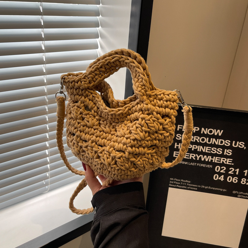 designer 2025 New Hollow Woven Bag for Women Versatile Crossbody Bag Vacation Beach Bag Niche Artistic Shoulder Crossbody Bag