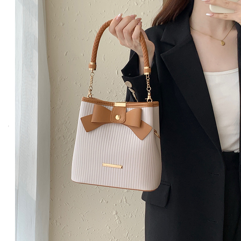 designer Niche Design Bowknot Bag for Women 2025 New Simple Handheld Bucket Bag Fashionable Textured Shoulder Crossbody Bag