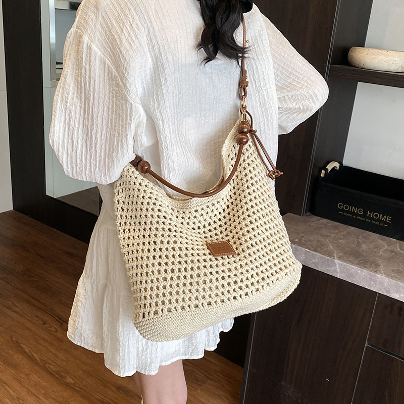 designer Summer Fashion Hollow Woven Bag for Women 2025 New Ins Simple Elegant Shoulder Bag Large Capacity Vacation Wom