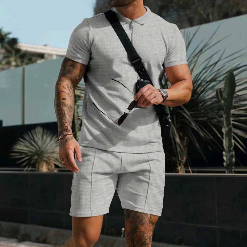 Summer New Mens Suit Fashion Printing Lapel Zipper 2 Piece Set Short-sleeved T-shirt and Shorts Sportswear Beach Suit W250609
