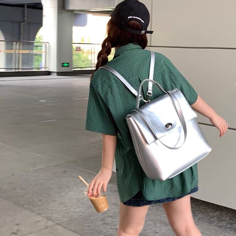 designer Niche High-End Silver Backpack Student Large Capacity Soft Leather School Bag Korean Style Versatile Fashion Shoulder Bag