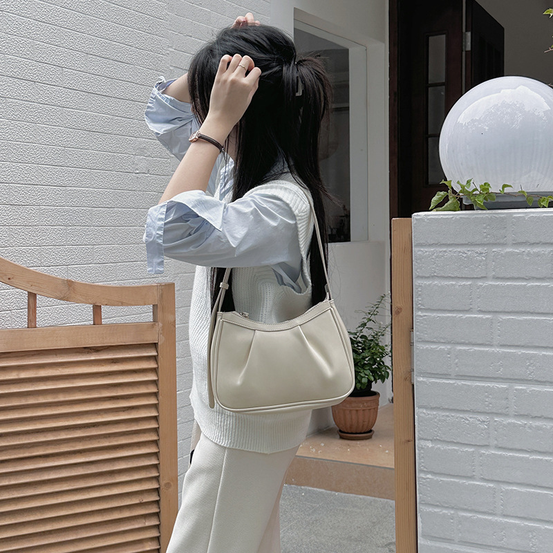 designer Korean Style High-End Single Shoulder Crossbody Bag for Women 2025 New Ins Pleated Cloud Dumpling Baguette Underarm Bag