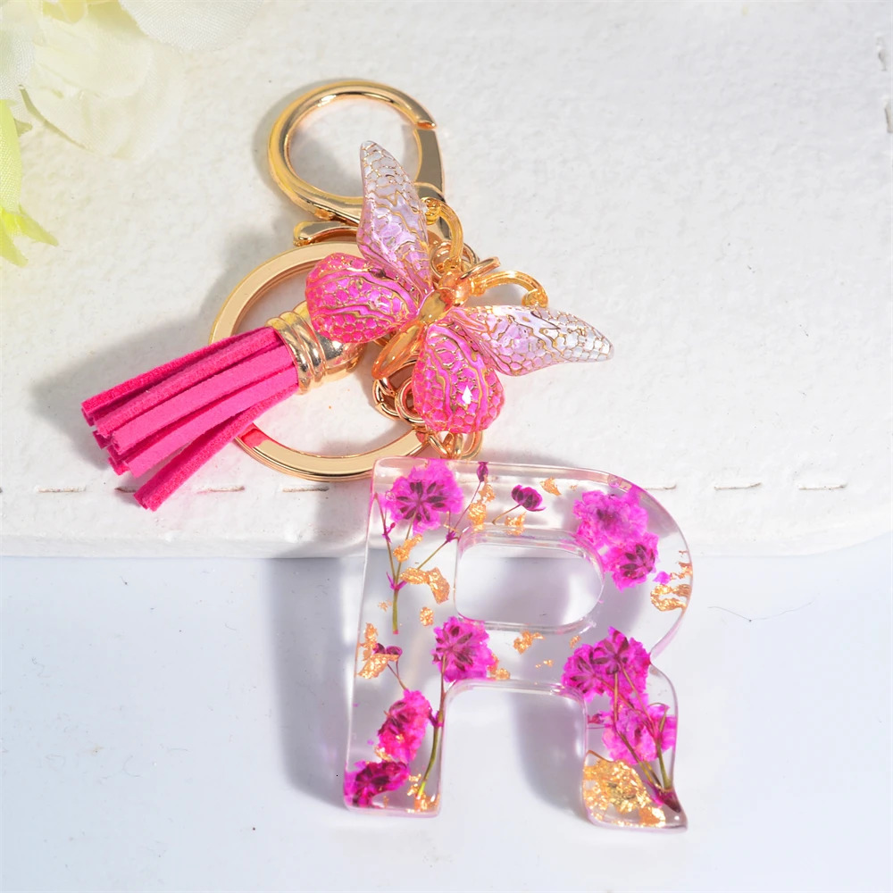 Exquisite Pink Dry Flower Resin 26 Initial Keychain Butterfly Tassel Pendant A to Z Keyring for Women Valentines Day Gift 250606