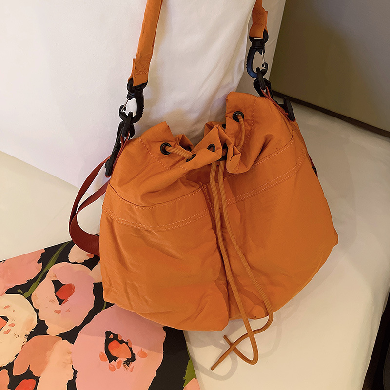 Free Shipping 2025 Summer New Casual Multifunctional Oxford Cloth Backpack Luxury Designer Bags Fashion Bucket Bag Handheld Shoulder Crossbody Bag