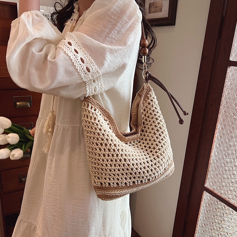 designer Beach Vacation Straw Woven Bag Women's 2025 Spring Summer New Commuter Shoulder Crossbody Bag Hollow Woven Tote Bag