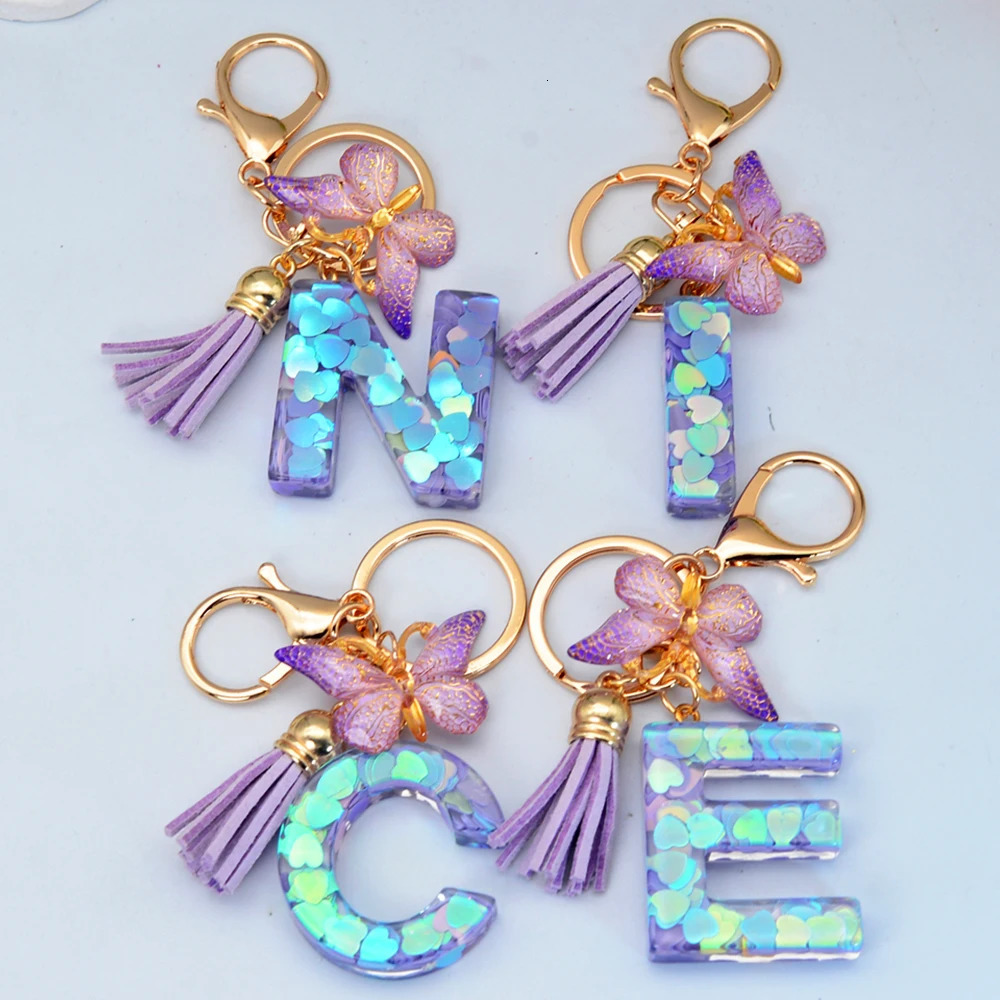 Exquisite 26 Initial Blue Shiny Resin Keychain A to Z Letter Purple Butterfly Tassel Pendant Keyring for Women Men Couple Gift 250606