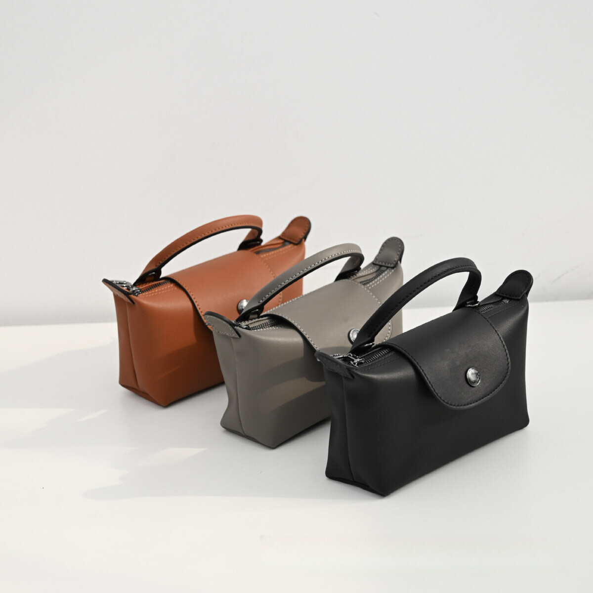 quality Brand High Quality New Style Free Delivery Designer Bag Maca Leather Store High-Quality Top Layer Cowhide Mini Dumpling Bag New Free Delivery 