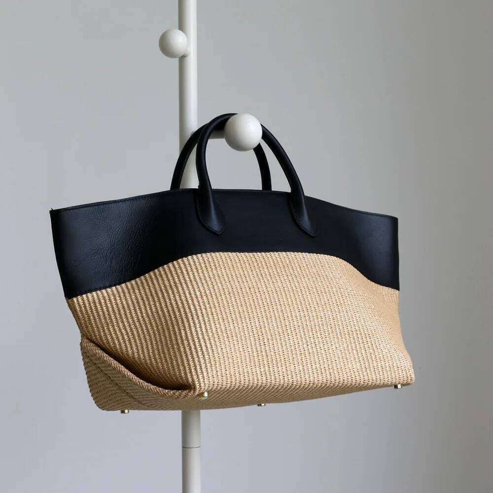 French straw woven tote 2025 new niche design cowhide splicing large capacity vacation beach vintage lady hand-woven bag