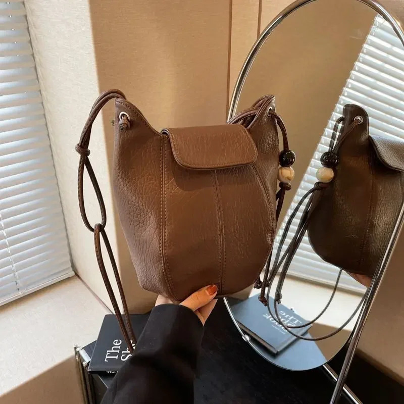 Leather womens bag first layer cowhide shell bag candy color mobile phone fashion all shoulder crossbody bag 250606