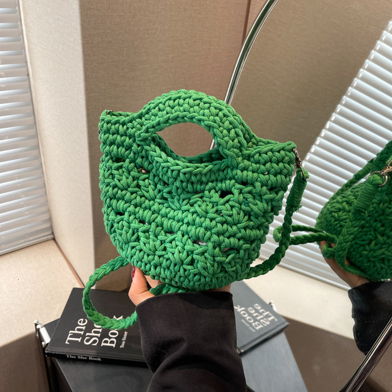 designer 2025 New Hollow Woven Bag for Women Versatile Crossbody Bag Vacation Beach Bag Niche Artistic Shoulder Crossbody Bag