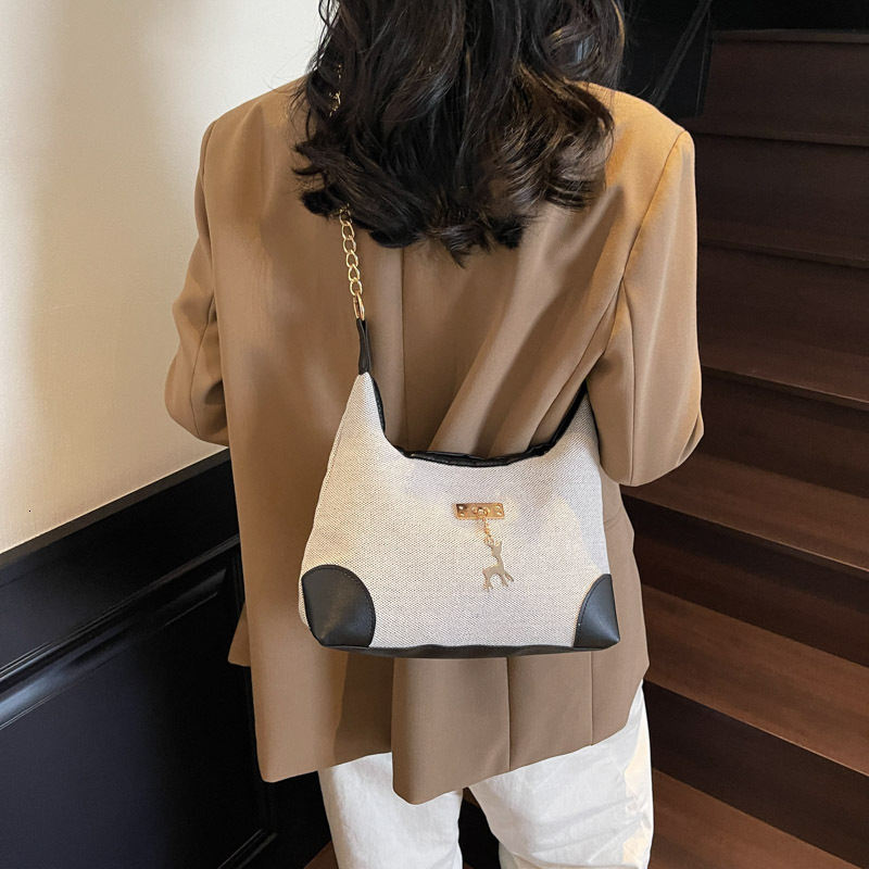 Top brand high-quality new free designer bag 202 new multifunctional bag fashionable shoulder bag unique high-end niche armpit bag brand new free desi