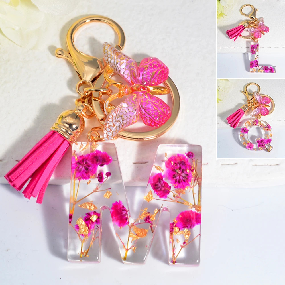 Exquisite Pink Dry Flower Resin 26 Initial Keychain Butterfly Tassel Pendant A to Z Keyring for Women Valentines Day Gift 250606