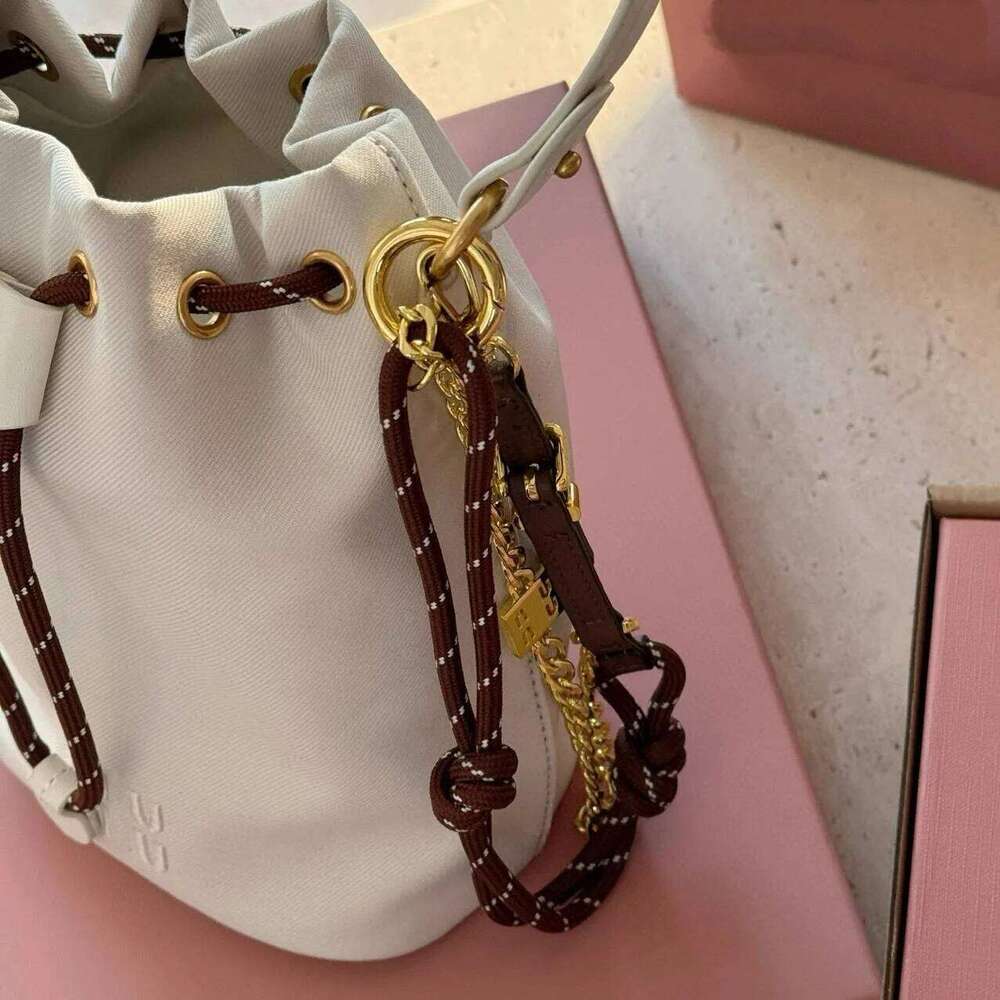 new summer lazy style high-end niche design bucket canvas bag, hand-held single shoulder diagonal cross bag