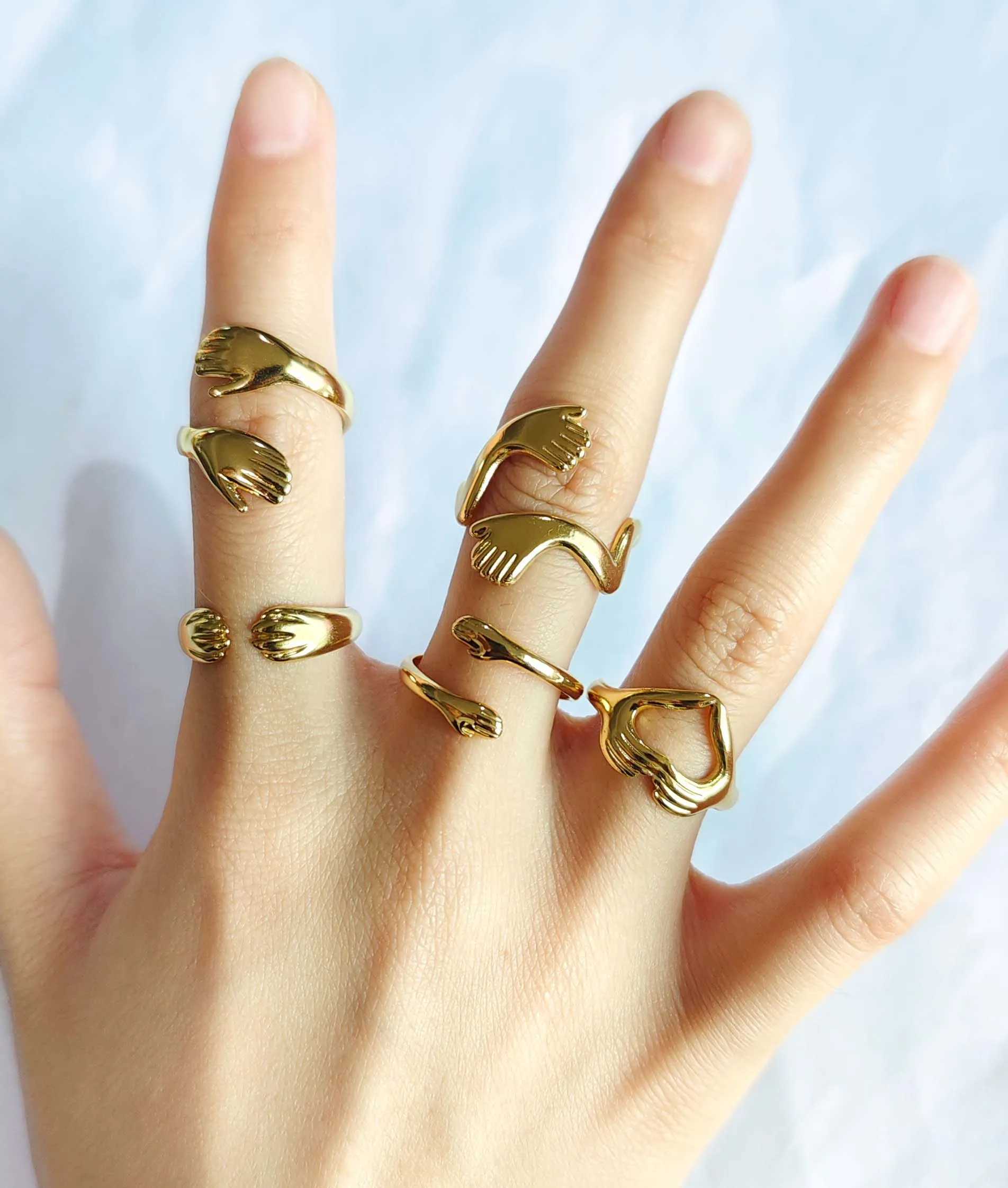 Stainless steel ins style ring love hug couples open adjustable index finger ring fashion Joker advanced sense suit. W250606