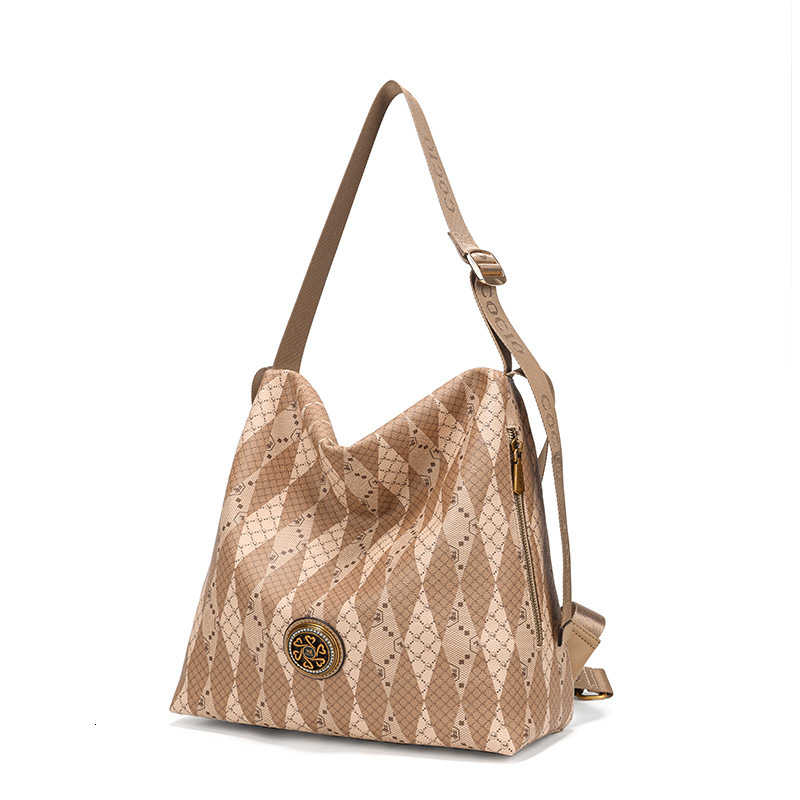 Free Shipping 2025 New Genuine Leather Shoulder Crossbody Bag Designer Bag With Geometric Printing And Contrasting Colors Large Capacity Travel Backpa