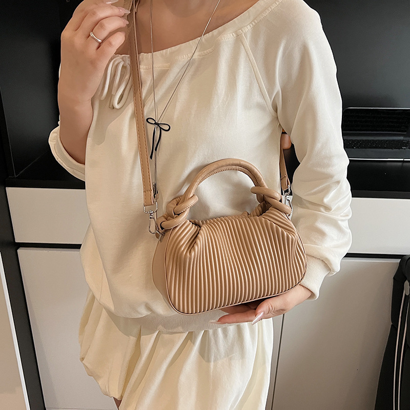 designer Niche Personality Pleated Striped Handbag for Women Fashion Versatile Bucket Bag 2025 Summer Simple Shoulder Bag