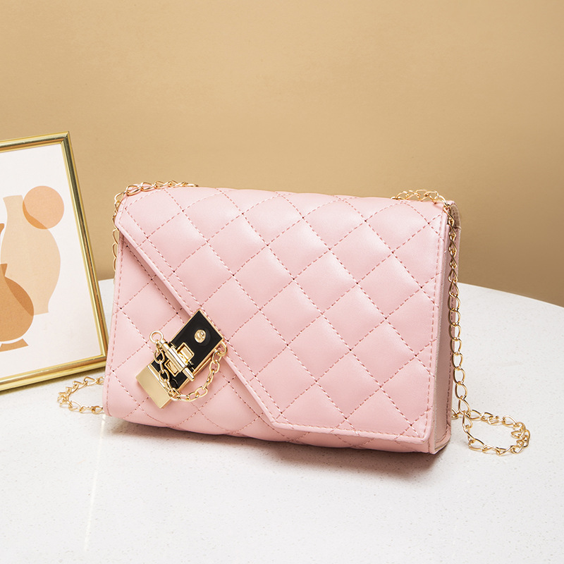 High quality brand new high-quality free designer bag new slanted shoulder missing corner small square bag fashionable quilted lock bag brand new free