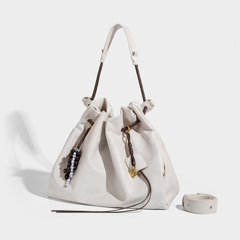 Free Shipping 2025 Summer New Fashion Luxury Versatile Designer Bags Handbag Niche Drawstring Design Bucket Bag High-end Single Shoulder Tote Bag