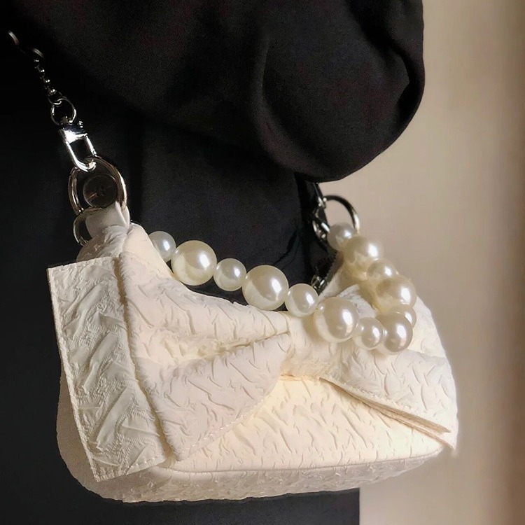 designer Underarm Bag for Women Summer Ins Super Popular Bowknot Pearl Chain Bag Niche Handbag Wrinkled Shoulder Crossbody Bag