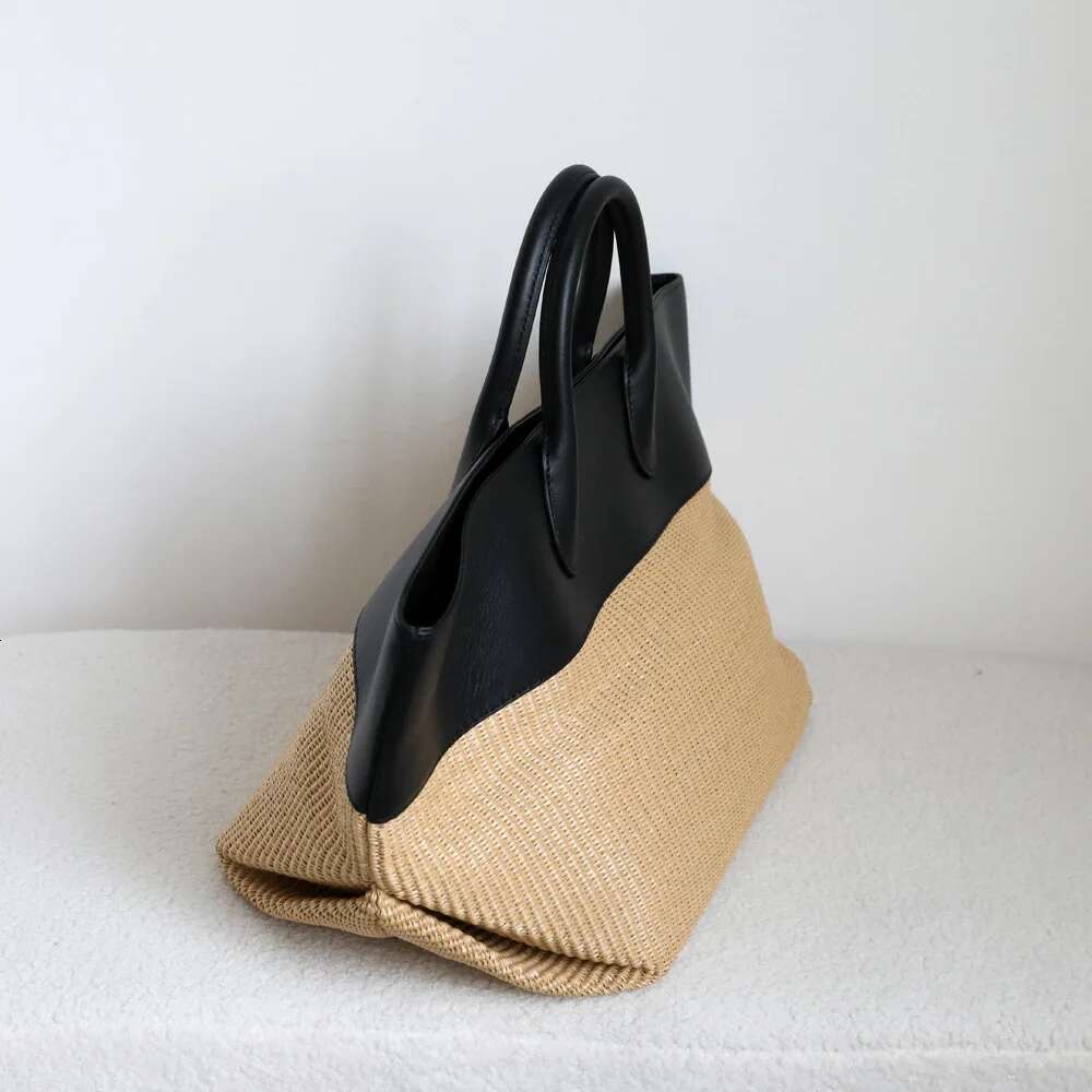 French straw woven tote 2025 new niche design cowhide splicing large capacity vacation beach vintage lady hand-woven bag