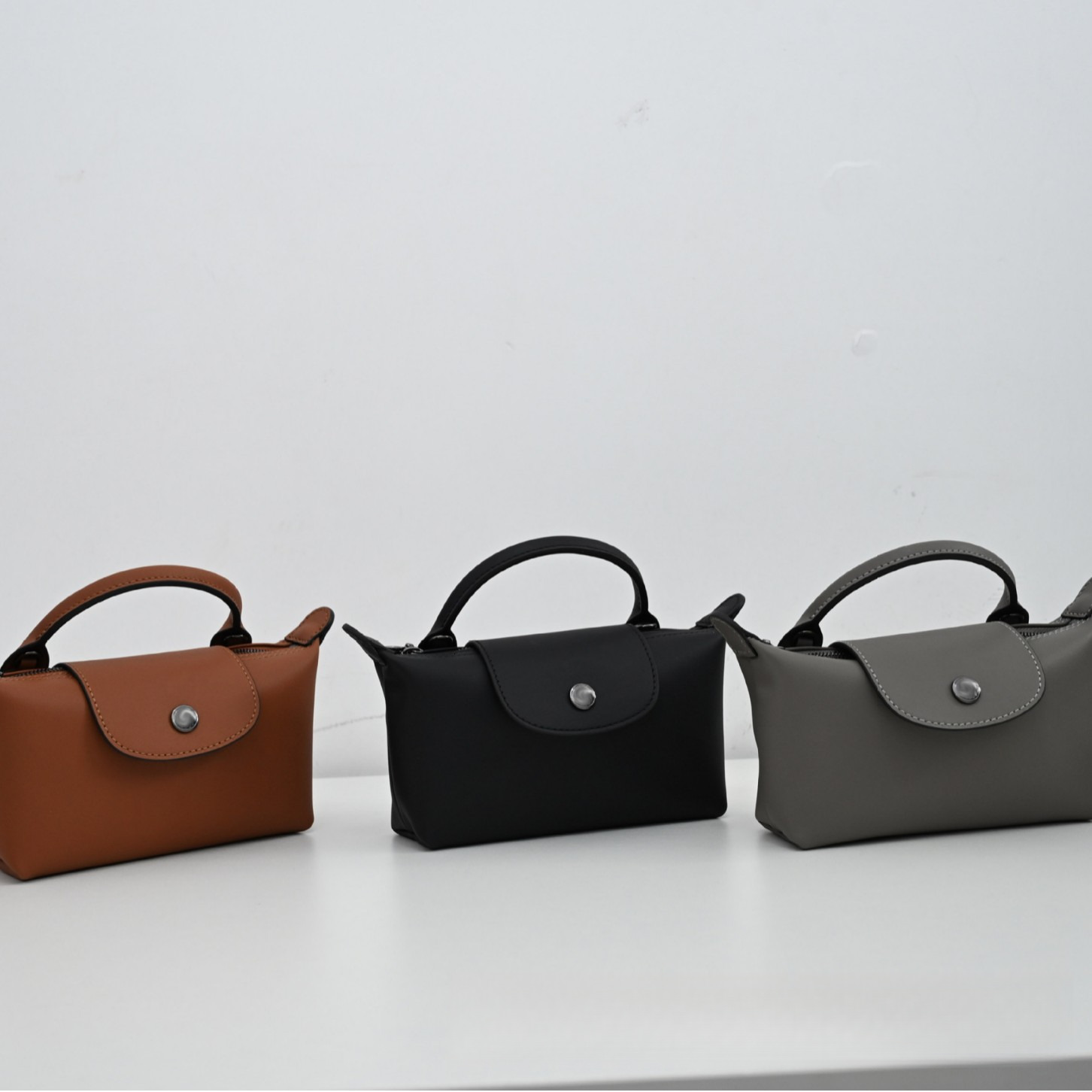 quality Brand High Quality New Style Free Delivery Designer Bag Maca Leather Store High-Quality Top Layer Cowhide Mini Dumpling Bag New Free Delivery 