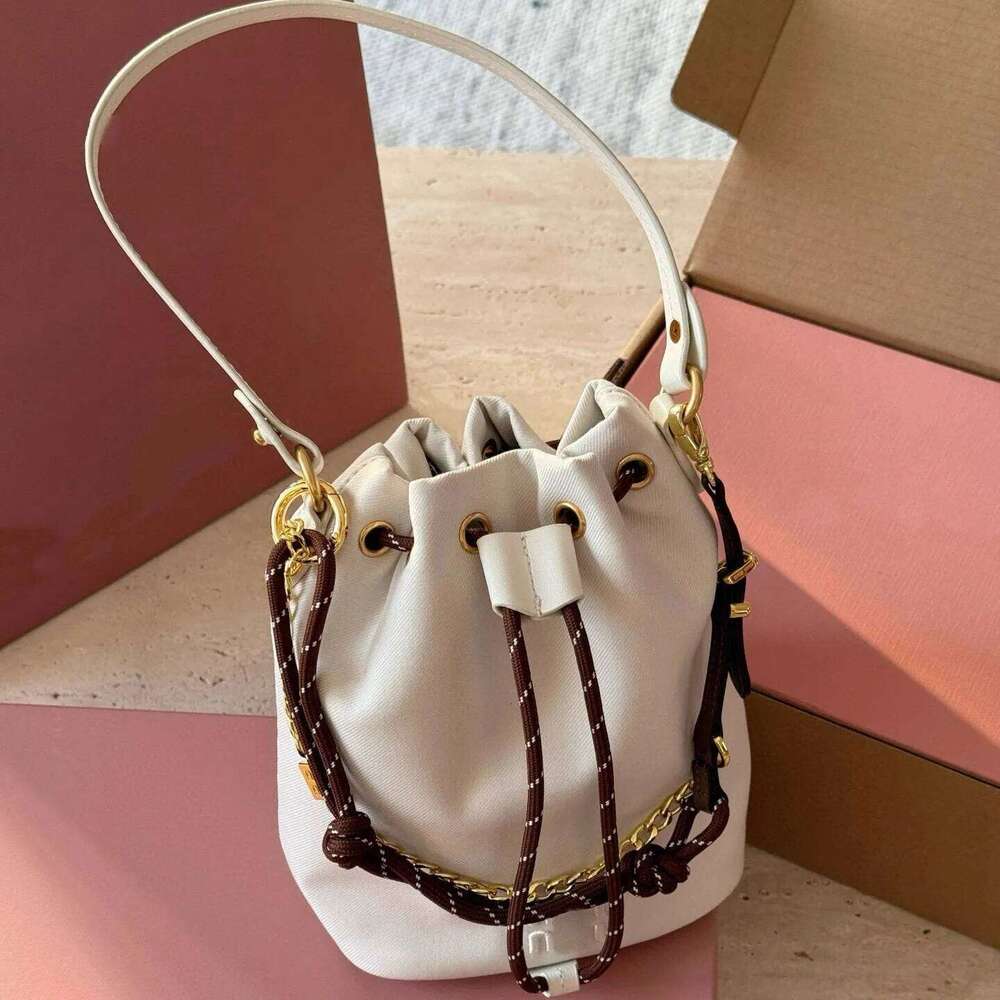 new summer lazy style high-end niche design bucket canvas bag, hand-held single shoulder diagonal cross bag
