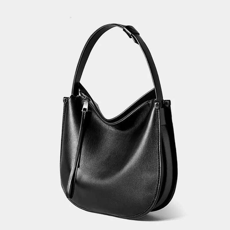 Elegant Cowhide Material for Durable Women's Totes Contemporary Fashion Accessory