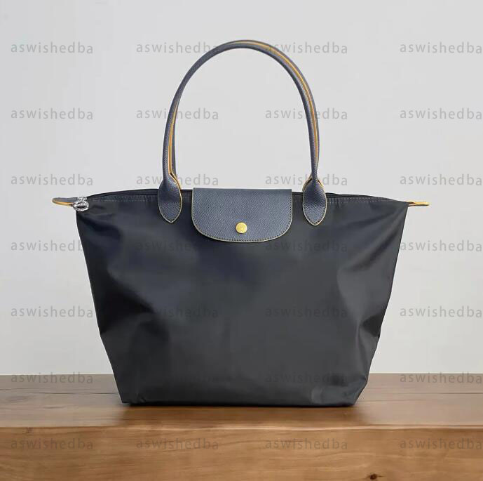 Designer bag luxury bag 2025 foldable tote bag laptop shopping bag women men lady beach bag waterproof shoulder bag travel big bag 3 sizes