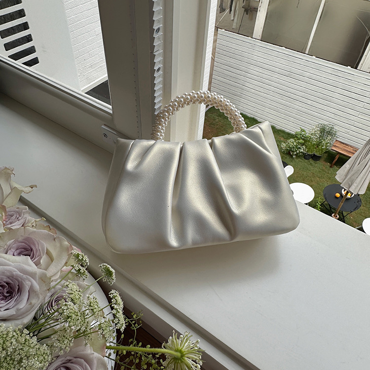 designer 2025 New Niche Handbag for Women Pearl Wrist Pleated Cloud Tote Bag Girl's Shoulder Crossbody Mini Bag