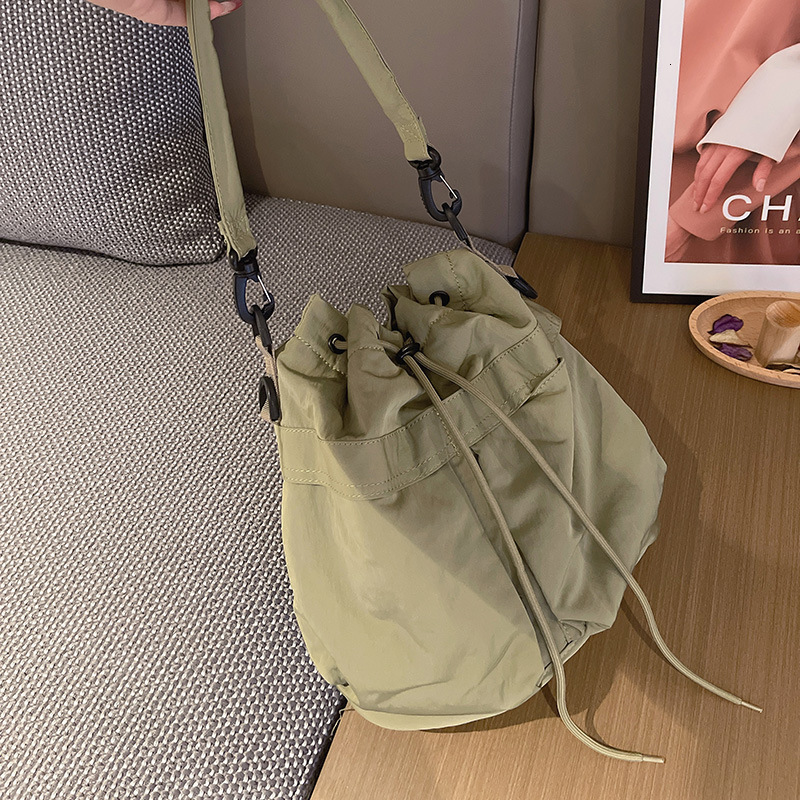 Free Shipping 2025 Summer New Casual Multifunctional Oxford Cloth Backpack Luxury Designer Bags Fashion Bucket Bag Handheld Shoulder Crossbody Bag