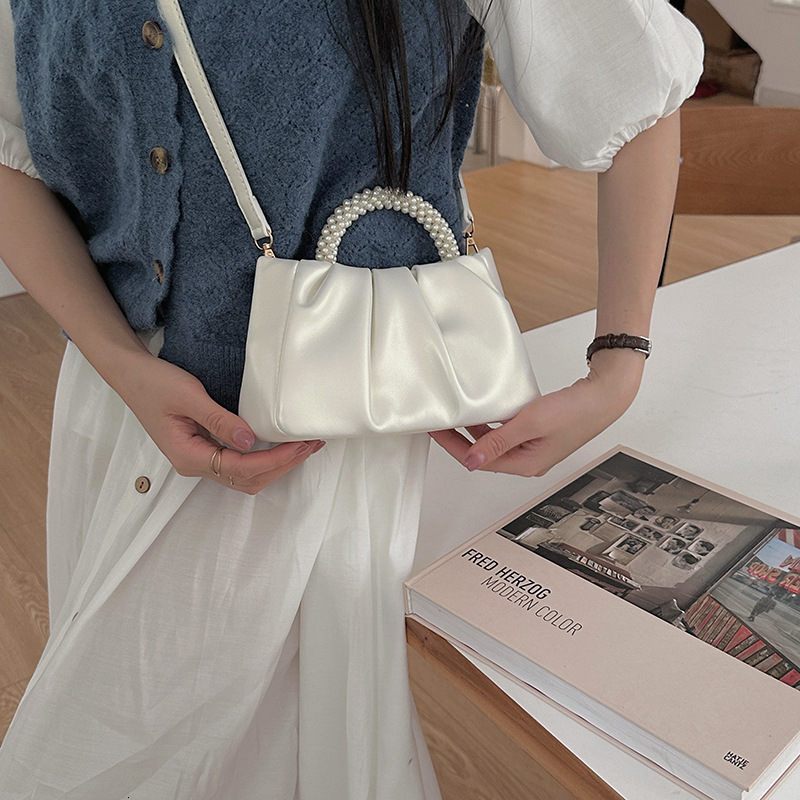 designer 2025 New Niche Handbag for Women Pearl Wrist Pleated Cloud Tote Bag Girl's Shoulder Crossbody Mini Bag