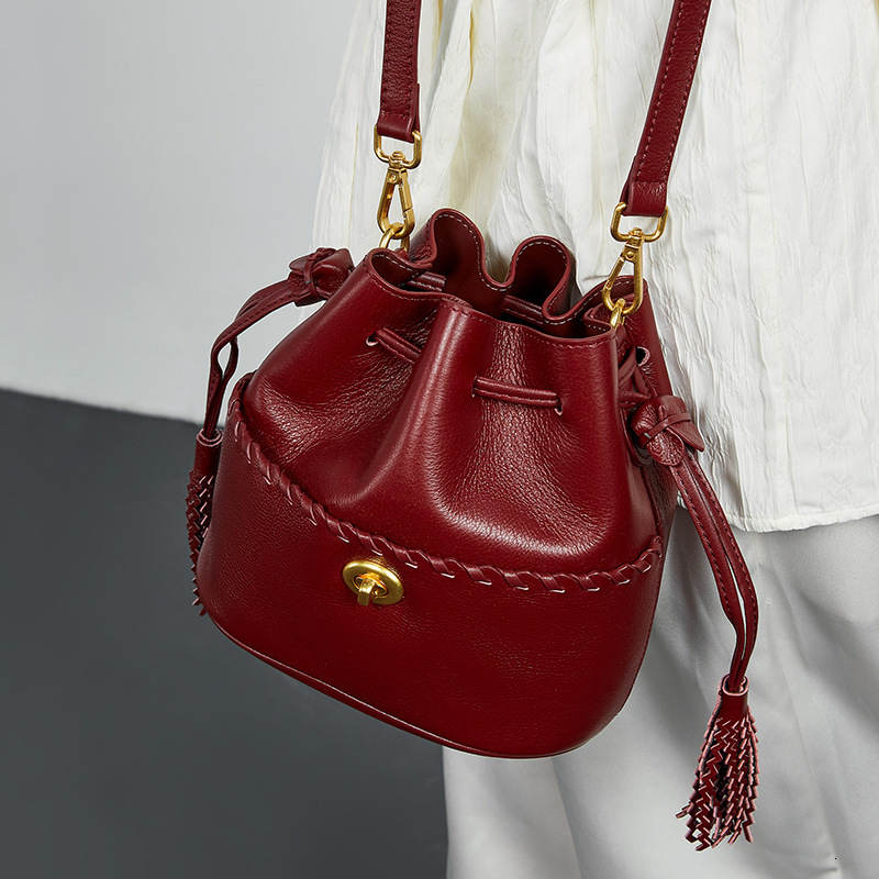 Free Shipping Luxury Top Layer Cowhide Bucket Bag 2025 New Designer Leather Women's Bag Tassel Niche Drawstring Shoulder Crossbody Bag Handbag