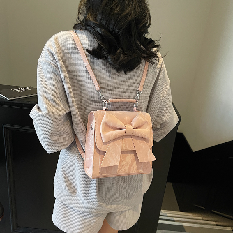 designer Women's Backpack 2025 New Style Textured Niche Design Handheld Korean Version Bowknot School Bag Casual Travel Backpack