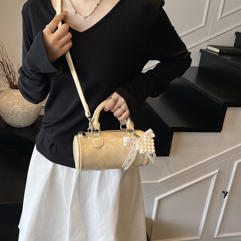 designer Niche Design High-End Handheld Small Bag for Women 2025 New Versatile Cylinder Bag Simple Shoulder Crossbody Women's Bag