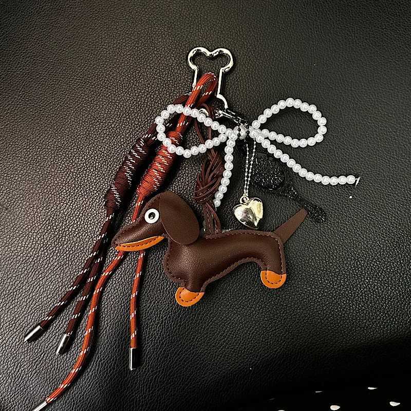 Vintage Maillard Color Cute Sausage Dog Bag Pendant Bow Bag Premium Accessories Hanging Rope XJ250607