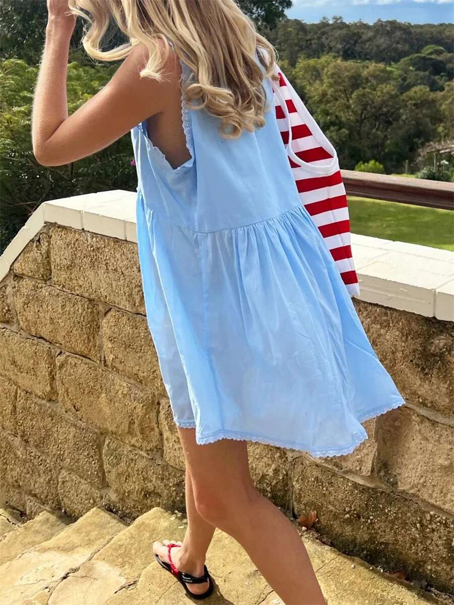 Womens Sleeveless Floral Print Mini Dress with Deep v Neckline and Eyelet Detailing - Perfect for Summer Beach Days