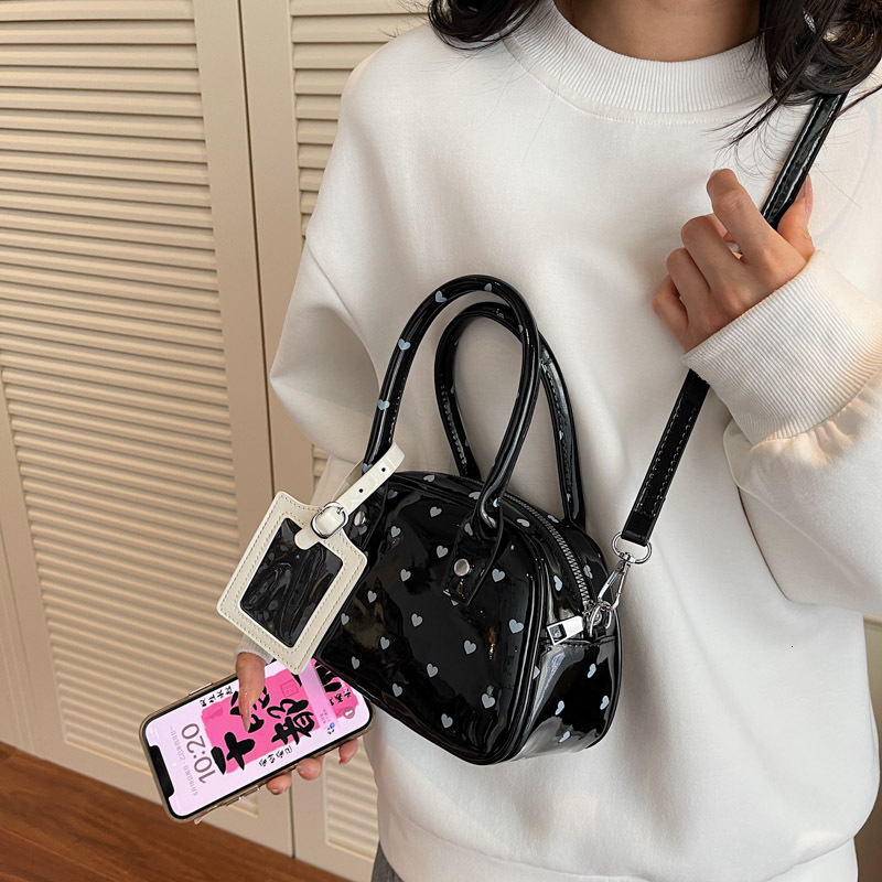 designer Korean Style Cute Polka Dot Handbag for Women 2025 New Niche Design Handheld Bag Commuter Shoulder Crossbody Small Bag