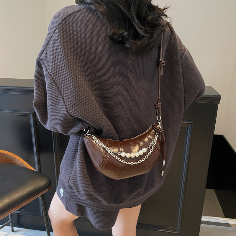 designer 2025 New Niche Design Trendy Simple Solid Color Horn Bag Versatile Commuter Fashion Single Shoulder Crossbody Bag for