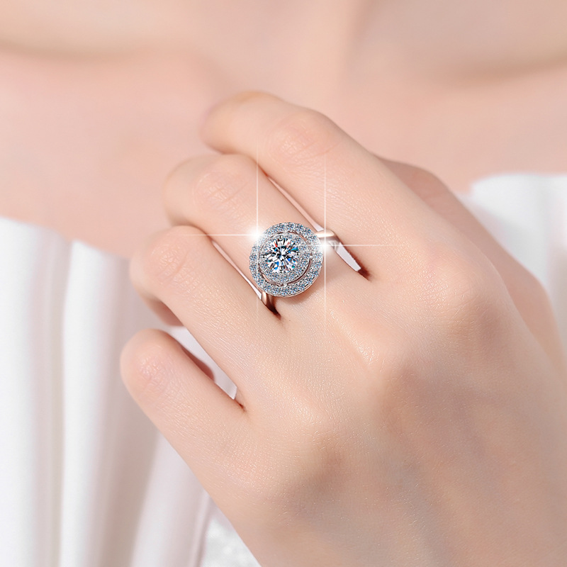 Artisan Crafted Wedding Band Highlighting A Lustrous Single Cut Moissanite Gemstone Amidst Floral Design