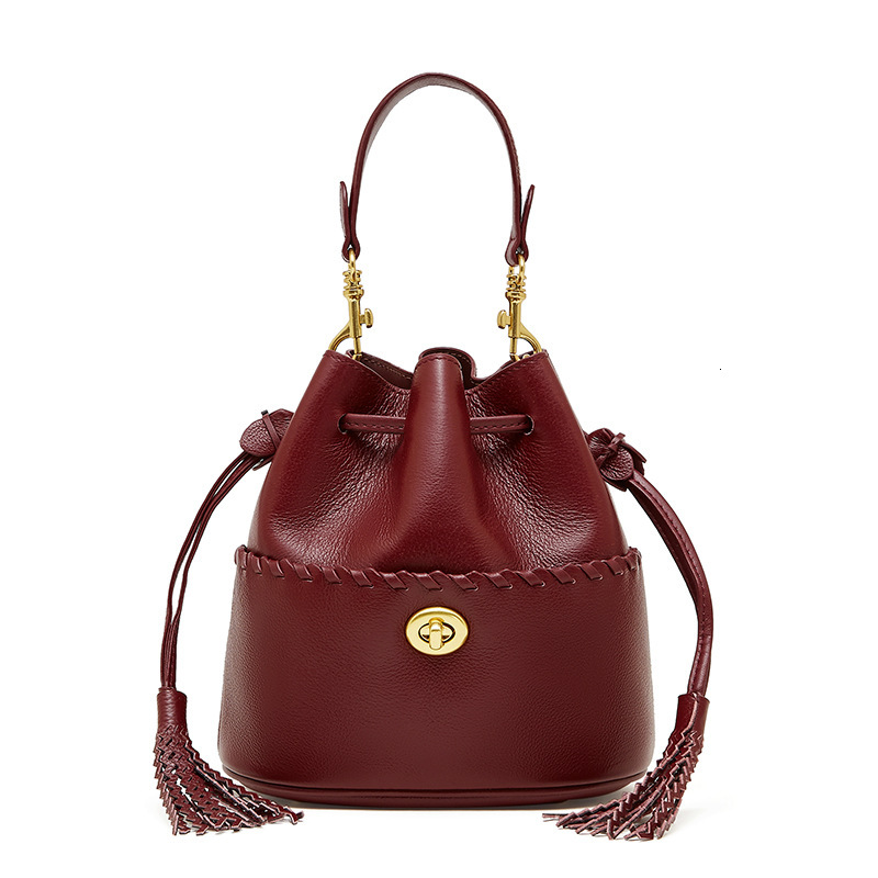 Free Shipping Luxury Top Layer Cowhide Bucket Bag 2025 New Designer Leather Women's Bag Tassel Niche Drawstring Shoulder Crossbody Bag Handbag