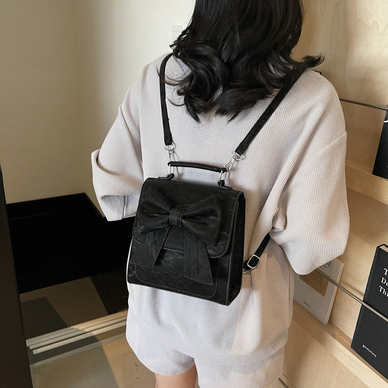 designer Women's Backpack 2025 New Style Textured Niche Design Handheld Korean Version Bowknot School Bag Casual Travel Backpack
