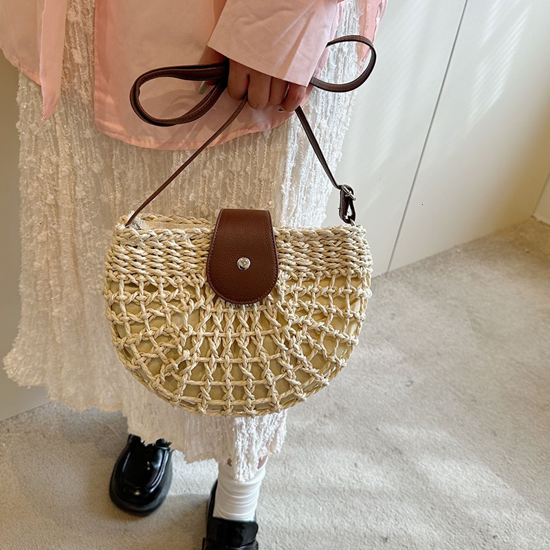 designer Summer Beach Vacation Woven Saddle Bag for Women 2025 New Trendy Versatile Casual Commuter Crossbody Straw Bag