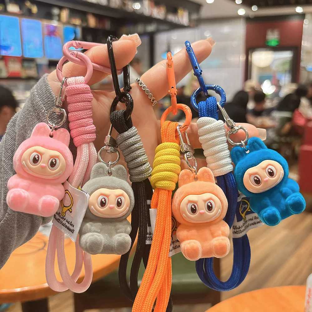 New Trend Cartoon Labubu Keychain Flocked fabric Cute Doll Bag Pendant Fashion Car Key Chain Accessories Gift A41 XJ250607